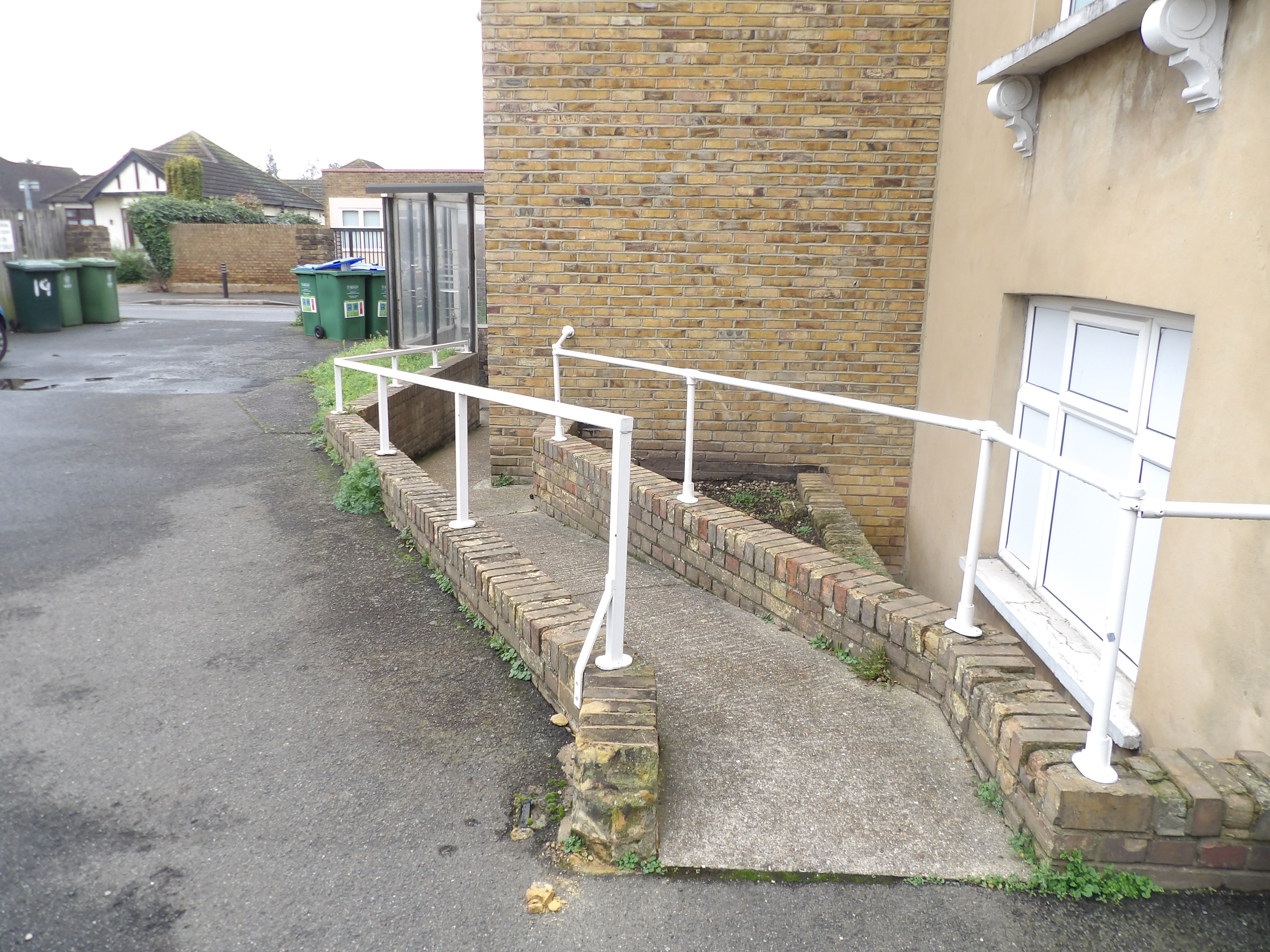 There is a ramp and railings to the front door